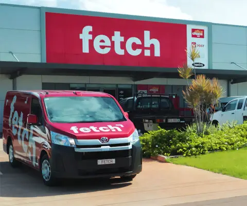 Fetch delivery van parked outside company building
