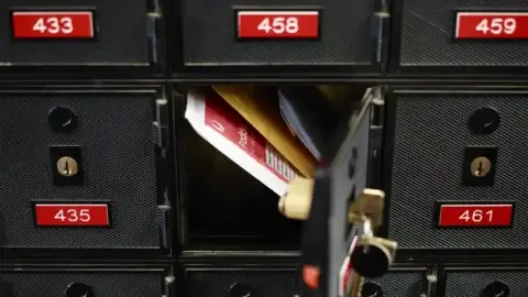 Open mailbox with parcels inside