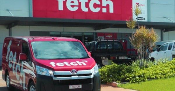 Fetch delivery van outside their store.