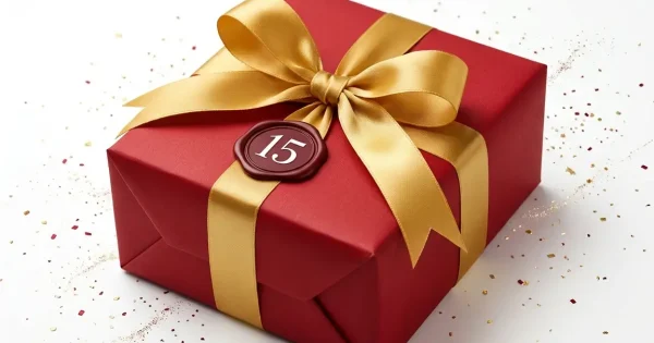 Red gift box with gold ribbon and seal